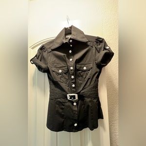 Cap sleeve when folded held by button.